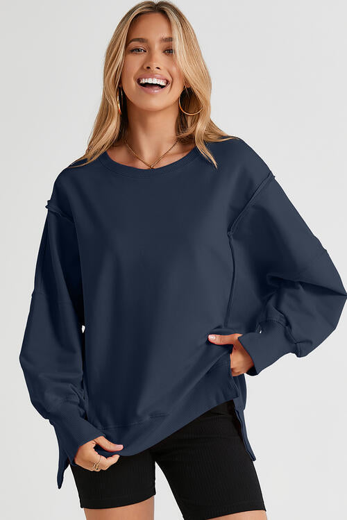 Exposed Seam Long Sleeve Slit Sweatshirt