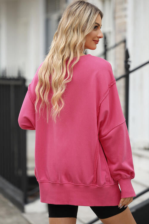 Exposed Seam Long Sleeve Slit Sweatshirt