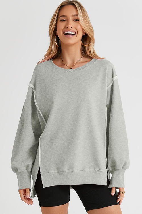 Exposed Seam Long Sleeve Slit Sweatshirt